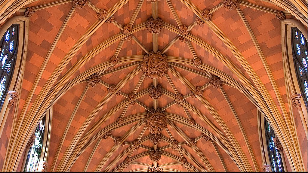 cathedral ceiling with plaster ornaments after restoration
